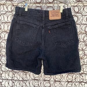 Vintage 90s Ladies Levi’s 951 relaxed fit black jean shorts Size 12